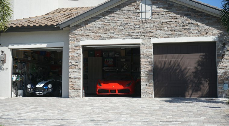 Car is parked in the garage of a house